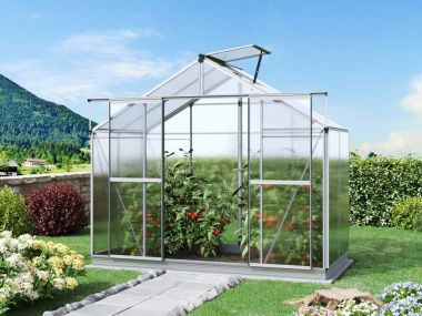 Die Frontansicht des Gewaechshauses Orchidee 2 enthüllt eine moderne Struktur und hochwertige Materialien, die eine optimale Pflege der Pflanzen ermöglichen.